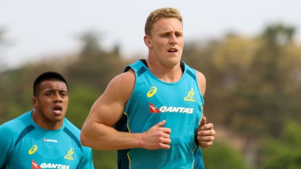 Flexible: Reece Hodge gets some kilometres into his legs at Wallabies training on Monday.