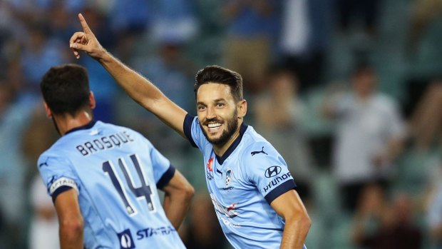 Another one: Milos Ninkovic celebrates with Alex Brosque after scoring a goal against Wellington.