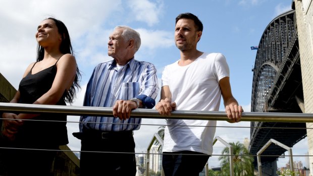 Gadigal woman Lille Madden with her grandfather Uncle Charles Madden and Kamilaroi artist Jonathan Jones at Dawes Point.