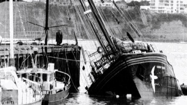 The Greenpeace vessel Rainbow Warrior lying in Auckland Harbour on July 10, 1985, after being sunk by French agents.