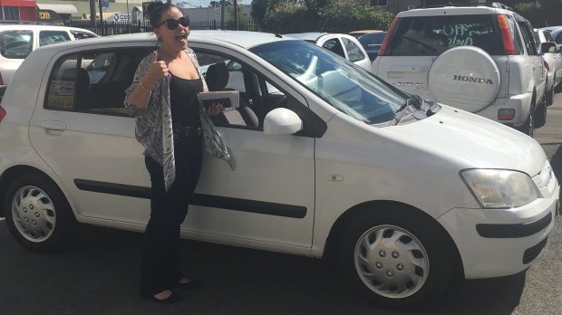 The woman and child may be travelling in a white 2005 Hyundai Getz, with Queensland registration 642-IUN.