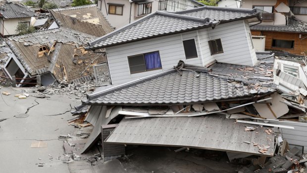 Damaged houses sit after an earthquake in Mashiki, Kumamoto prefecture in 2016.