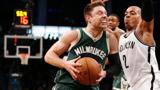 Milwaukee Bucks' guard Matthew Dellavedova drives past Brooklyn Nets' guard Randy Foye.