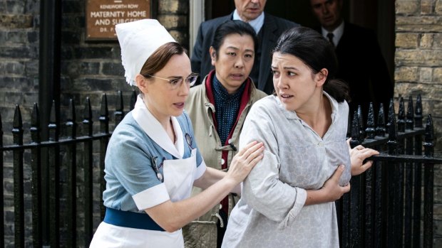 Stephen McGann as Dr Patrick Turner, Lucy Sheen as Oilen Chen, Laura Main as Shelagh Turner and Alice Connor as Lucy Chen in <i>Call The Midwife</i>.