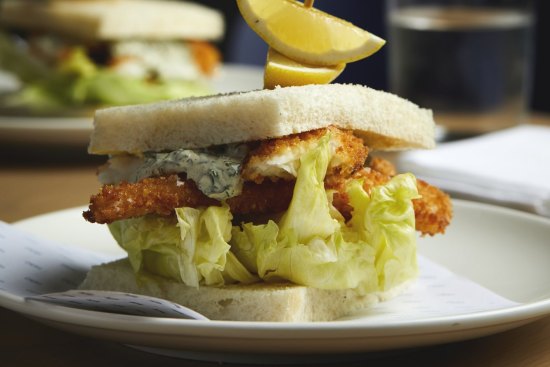 Crumbed fish sandwich with tartare and iceberg.