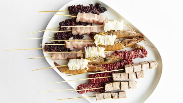 Stokehouse's barbecue box includes wayu and squid skewers.