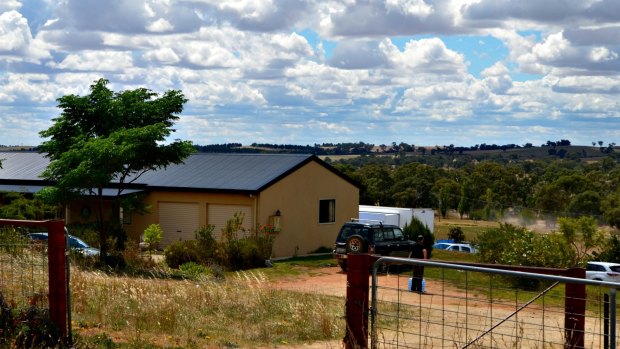 The property in Young, NSW, being searched by the Australian Federal Police on Tuesday.