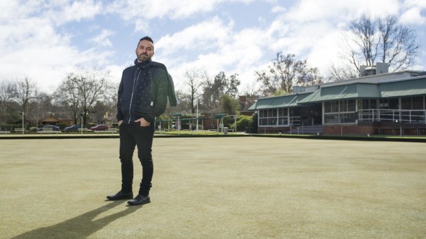 Nik Bulum at the Canberra City Bowling Club site after buying it last year.
