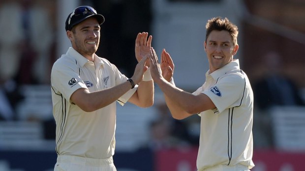 Trent Boult and Tim Southee celebrate a wicket during the tour of England.