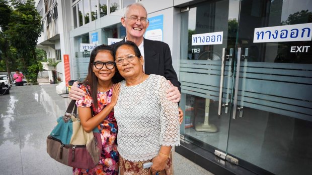 Alan Morison and Chutima Sidasathian with Chutima's mother after their acquittal in Phuket in September.