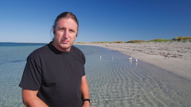 Tim Winton has donated prize money from his book The Boy Behind the Curtain to help protect the Ningaloo Reef.