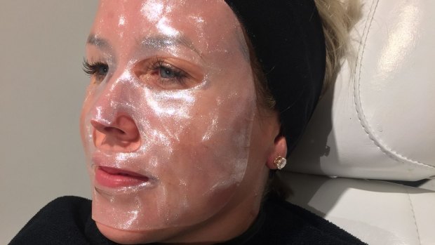 Daily Life reporter Amy Croffey wearing the diamond face mask at Verdem skin clinic in the QVB, Sydney.