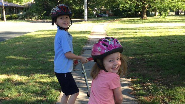 Aidan and Maeve Moloney enjoying the daily routine of getting to school on foot or two wheels.
