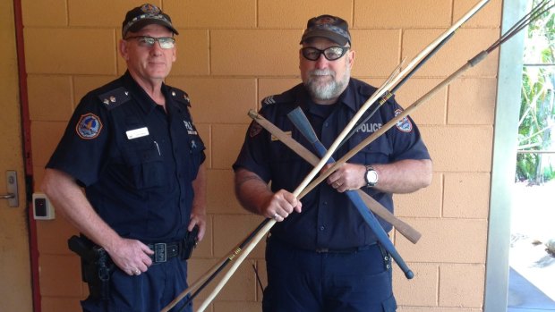 Acting Superintendent Steve Hayworth and Acting Senior Sergeant Owen Blackwell with a small number of the weapons confiscated following the fatal brawl.
