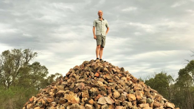 David Osmond of Dickson on the rock cairn atop Gossan Hill