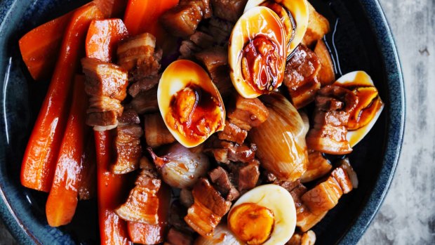 Slow-braised pork with carrots, eggs and red shallots.