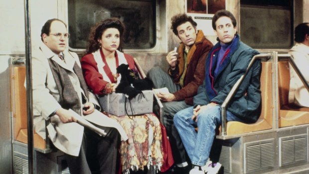 Julia Louis-Dreyfus as Elaine, with the rest of the Seinfeld cast.