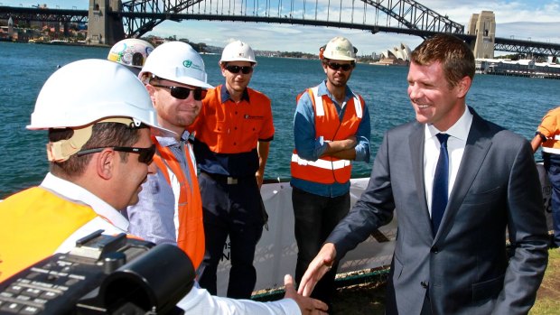 Premier Mike Baird announces the Sydney Rapid Transit train tunnel at Blues Point Reserve, McMahons Point next to a geotechnical testing drill on Wednesday.