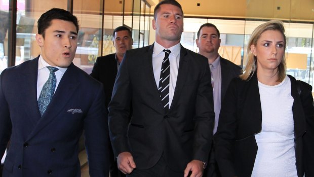 Shaun Kenny-Dowall, centre, arrives at court to face charges relating to his treatment of his former girlfriend, Jessica Peris. 