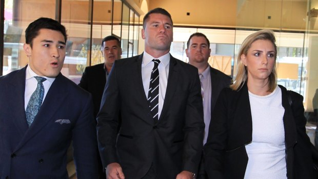 Shaun Kenny-Dowall, centre, arrives at court to face charges relating to his treatment of his former girlfriend, Jessica Peris. 
