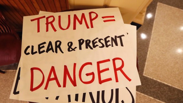 Protesters' signs in the US.