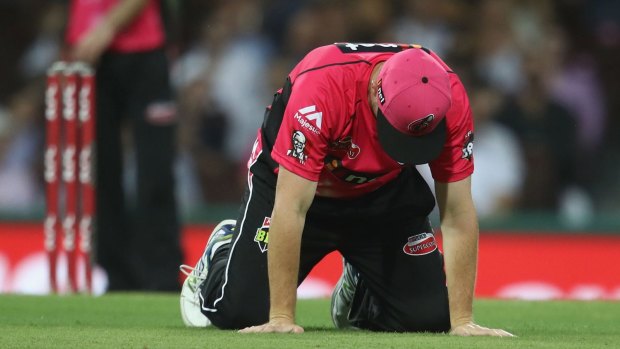 Brought to their knees: Colin Munro feels his side's pain.