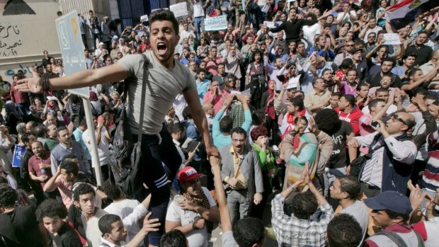 Protesters shout slogans against Egyptian President Abdel-Fattah el-Sisi in Cairo on Friday.