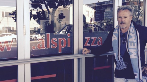 Pizza with the lot: Pizza shop owner and Sharks fan Paul Ellams.