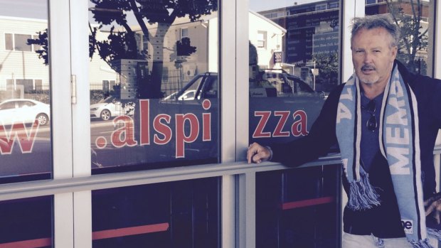 Putting his money where his mouth is: Pizza shop owner and Sharks fan Paul Ellams.