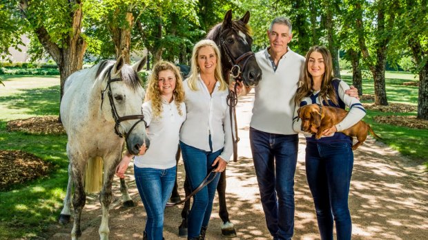 The Inglis family (from left), Alexandra, Charlotte, Arthur and Antoinette, with horses Billy the Kid (at left) and His Royal Emblem, and sausage dog Bilbo Baggins.