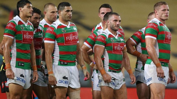 Unhappy reunion: Robbie Farah looks on with his new teammates during his regular-season debut for the Rabbitohs against his old club.