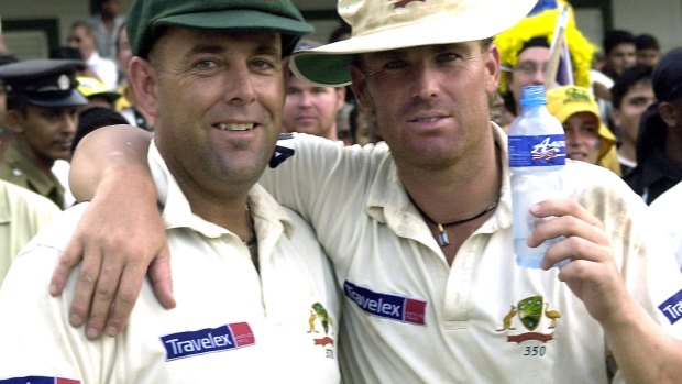How times change: Shane Warne and Darren Lehmann celebrate a Test win in 2004.