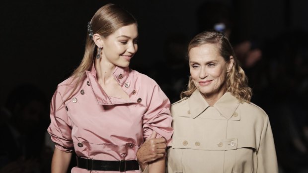 Models Gigi Hadid and Lauren Hutton walk the runway at the Bottega Veneta show during Milan Fashion Week.