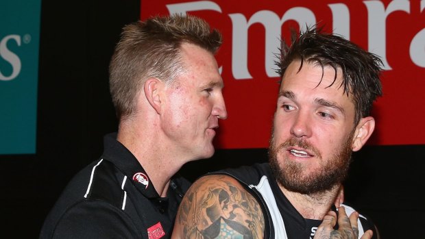 Bond: Dane Swan with Magpies coach Nathan Buckley.