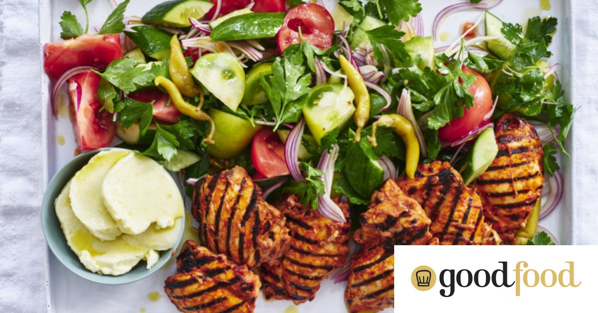 Grilled chicken with toum, and cucumber and tomato salad