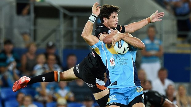 Clothesline: Mitchell Moses catches William Zillman high in a combustible moment at Robina. 