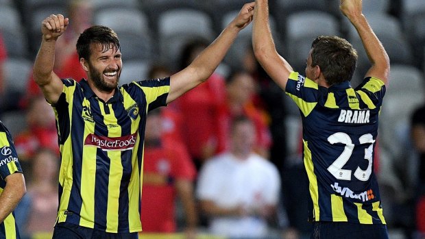 'I won't take it for granted': Golec celebrates a successful penalty with Wout Brama for the Mariners, a club that has allowed him stability after a scarcely believable period in his career.