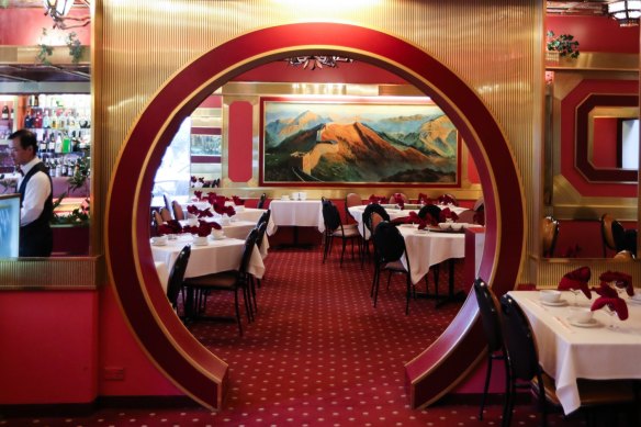 The main dining room is a controlled riot of octagons, gold and floral prints.