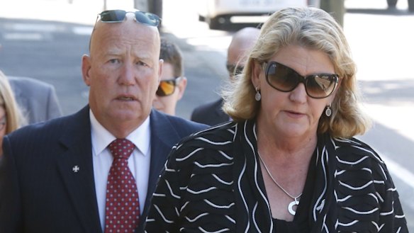 Constable Bill Crews' parents - Kel and Sharon Crews - arrive at the Coroner's Court in Glebe on Monday.