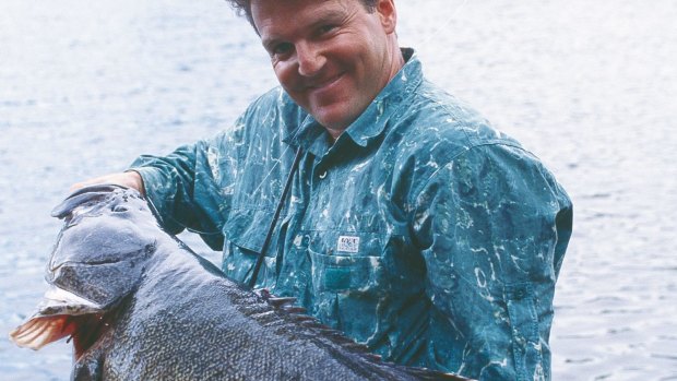 Rob Paxevanos and the giant Murray cod he caught on fly at Googong dam in 2001