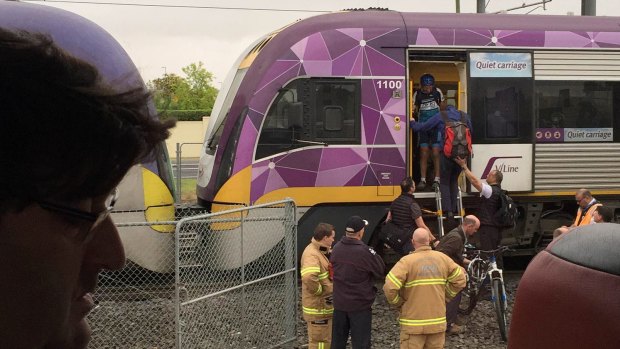 Passengers disembark the V/Line train at Watergardens.