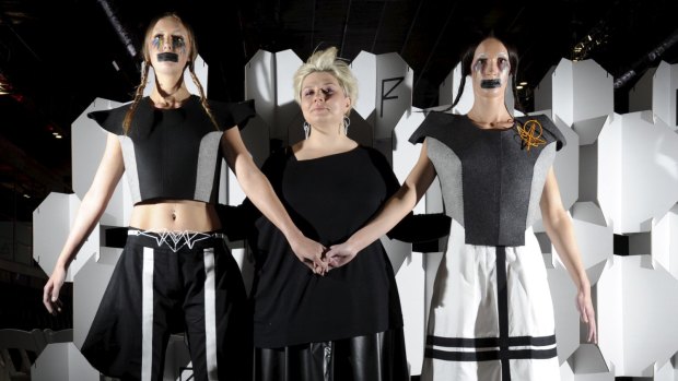 Canberra clothing designer, Louisa de Smet
of Watson with two of her creations under the label of "Corr Blimey",
modelled by Queanbeyan models, Cecilia North, left and Chelsea Marolt.
