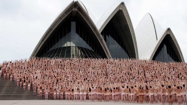 More than 5000 nude members of the public take part in Spencer Tunick's artwork at the Sydney Opera House.