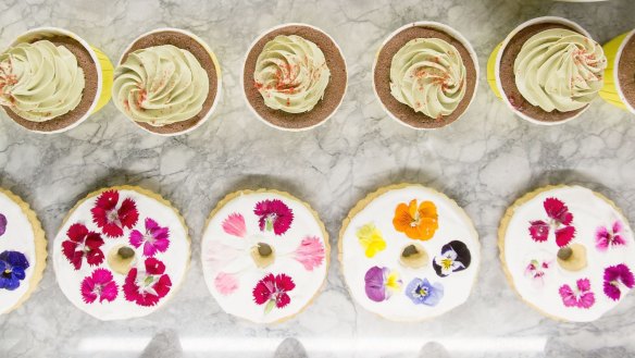 The cake display at the Rabbit Hole Organic Tea Bar includes the Instagram-friendly lavender shortbread.