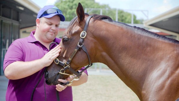 'it's all over': Nathan Tinkler with a horse from his stables at the 2010 Magic Millions.