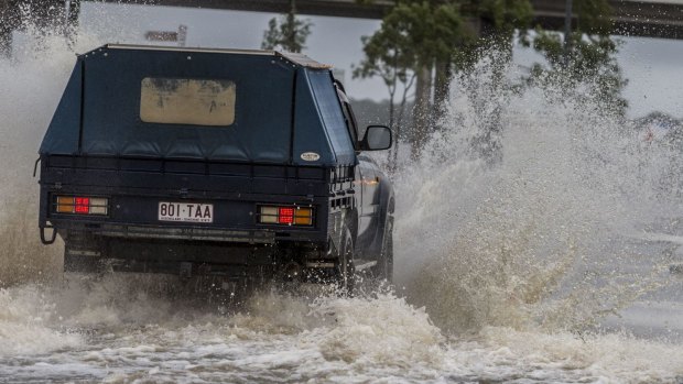 Floodwaters threaten communities in Queensland. 