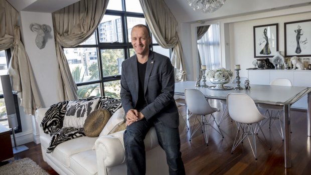 Craig Yelland, director of Plus Architecture, is a big advocate for apartment living. He is pictured in his Port Melbourne apartment, where has lived for five years with his wife and two children. 