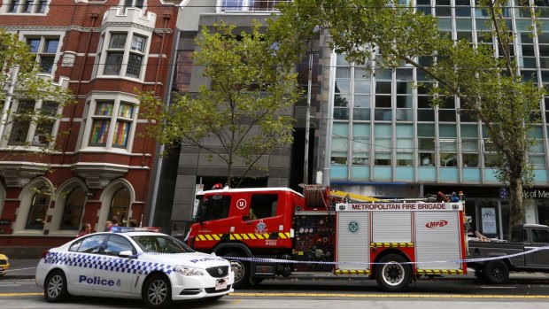 Emergency services at the scene on Collins St.