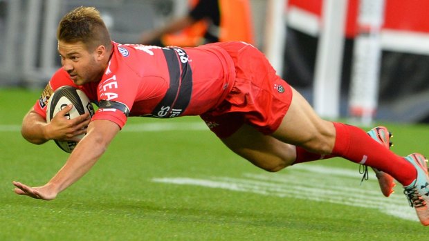Toulon's Australian winger Drew Mitchell scores the opening try.