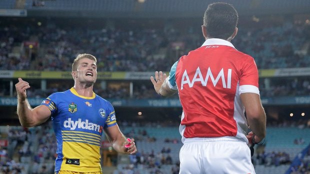 Making his point: Referee Matt Cechin speaks to Kieran Foran during the round three NRL match between the Canterbury Bulldogs and the Parramatta Eels at ANZ Stadium.